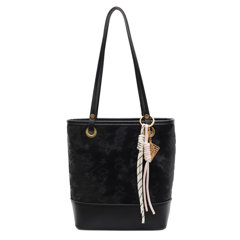 Bolsa de cubo de moda coreana para mujeres 2025, nuevo diseño universal de nicho para viajar bolso de hombro de moda bolso de mujer casual