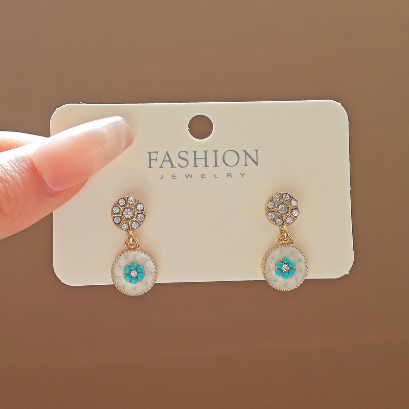 Corea del Sur 2024 nuevo diseño de nicho de alta gama nuevos pendientes de círculo chino de moda femenina pendientes de todo fósforo