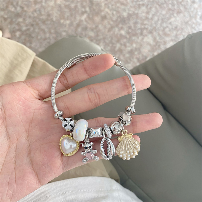 Nicho de la moda versátil pulsera de alto grado de lujo luz diseño personalizado pulsera de Saturno abierto de diamantes incrustado transfronterizo