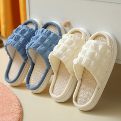シュークリーム亜麻のスリッパの卸売りの四季の厚い底の家の布の芸の涼しさは室内のカップルを引きずって糞感の綿麻のスリッパの女性を踏みます。
