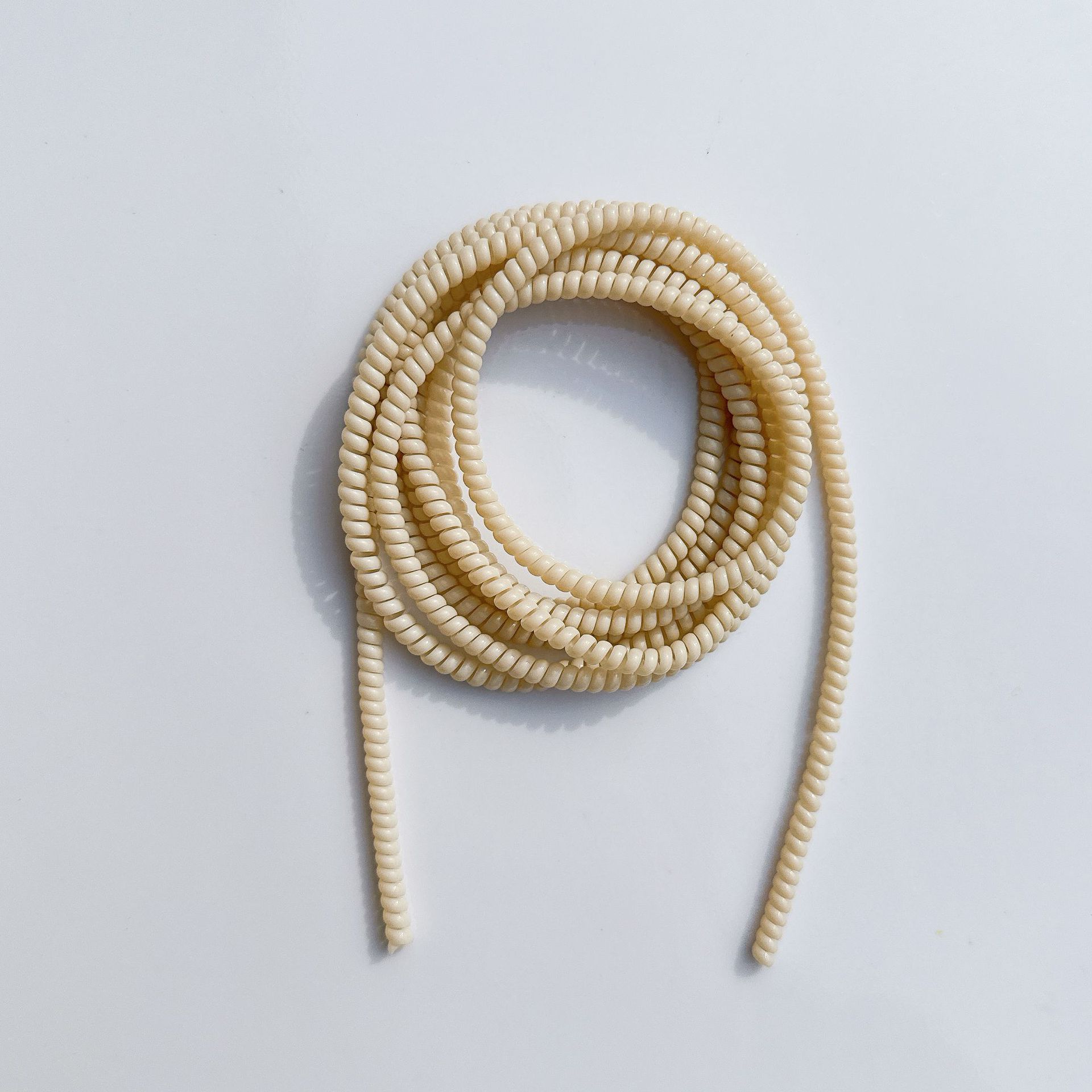 1.4 Cuerdas de protección de color sólido de 1,6 metros de cable de datos para línea de teléfono celular anti-ruptura cargador de cable de bobinado