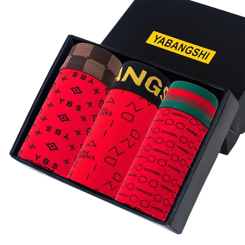 Ropa interior de los hombres boxeadores de los hombres impresos brillante rojo primavera Festival ceremonia de boda boxeadores Mediados de cintura cabeza en caja