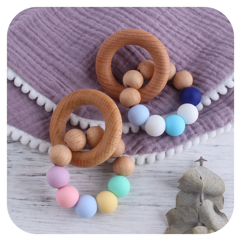 Nueva DIY creativo Beech anillo macaron color juguete teether bebé cuentas de silicona pulsera teether palo
