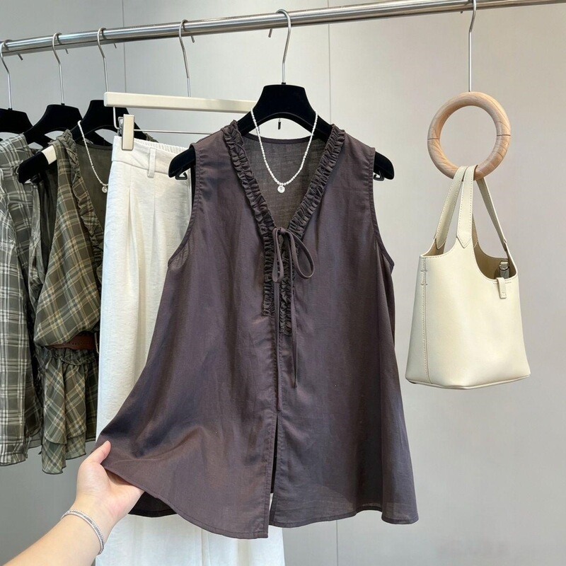 Summer sleeveless shirt with a tie-up detail, Korean-style design, loose and casual fit, versatile, elegant, and slimming Summer sleeveless shirt with a tie-up detail, Korean-style design, loose and casual fit, versatile, elegant, and slimming