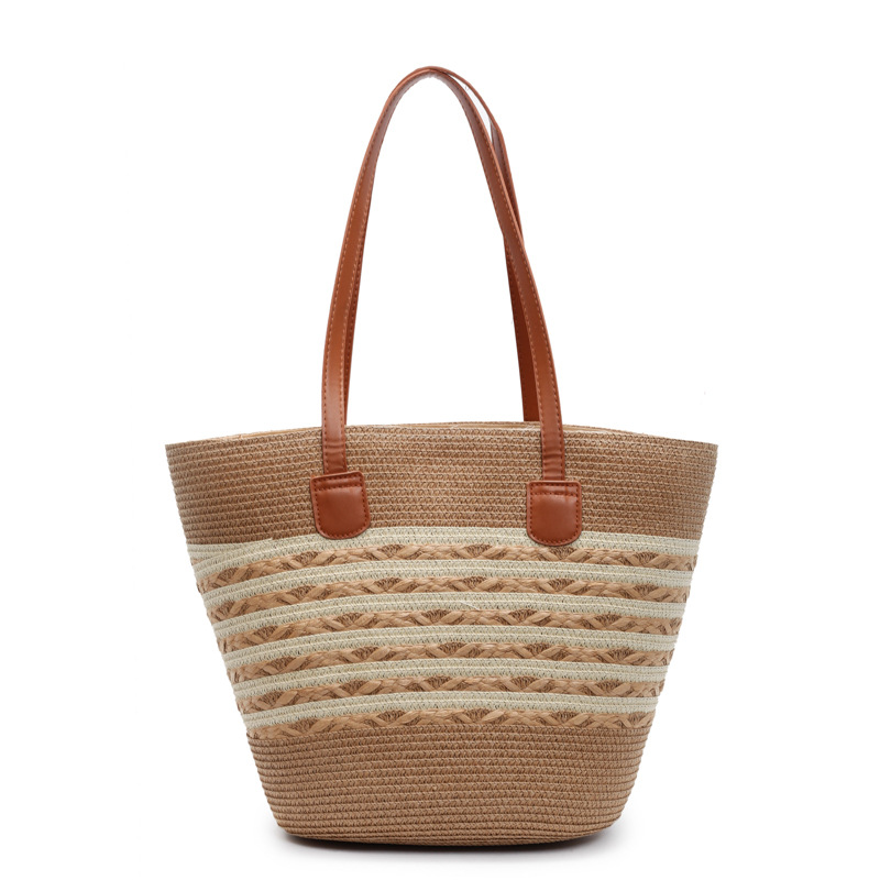 Venta caliente de verano bolso tejido de paja hueco para mujer 2025 nuevo bolso de hombro de estilo occidental salvaje bolso de alta capacidad
