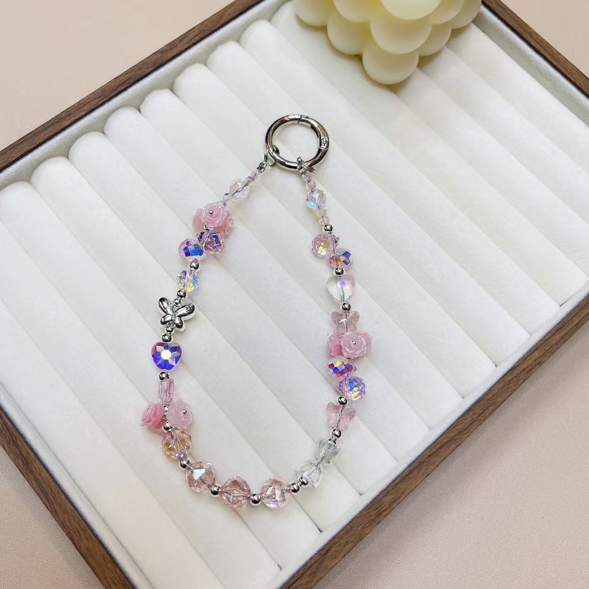 Ins Advanced Gel suave Luminous Rose Flower Funda para teléfono móvil Cadena colgante Aleación Mariposa Cordón portátil Lujo ligero Original