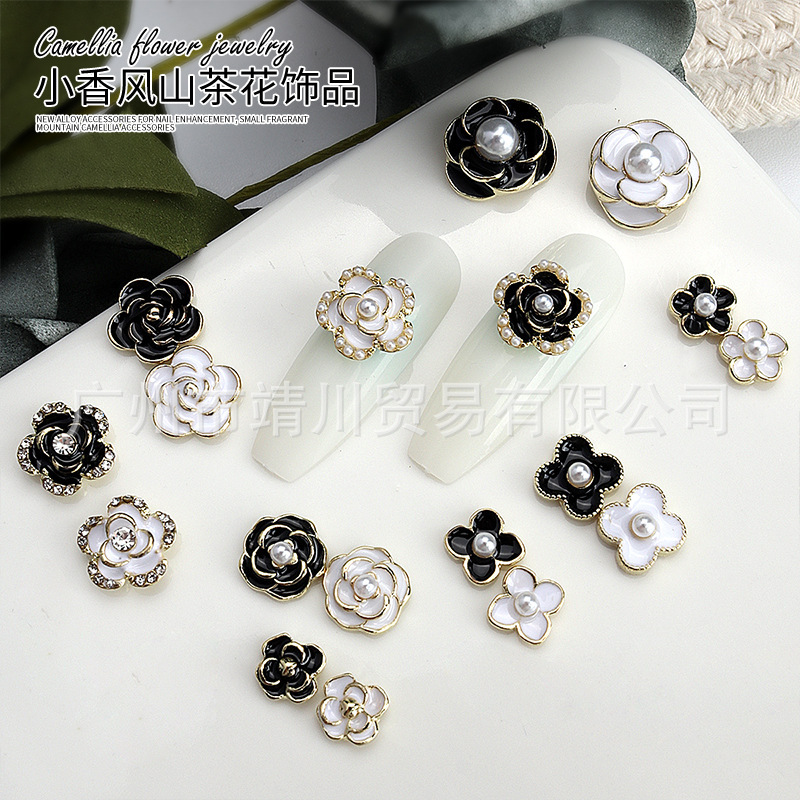 New manicure Camellia jewelry black white oil drop three-dimensional flower nail decoration nail drill wholesale direct sales