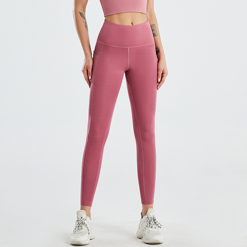 Amazon tamaño europeo pantalones de yoga transfronterizos bolsillo lateral de las mujeres melocotón cintura alta Levantamiento de cadera medias de fitness europeas y americanas