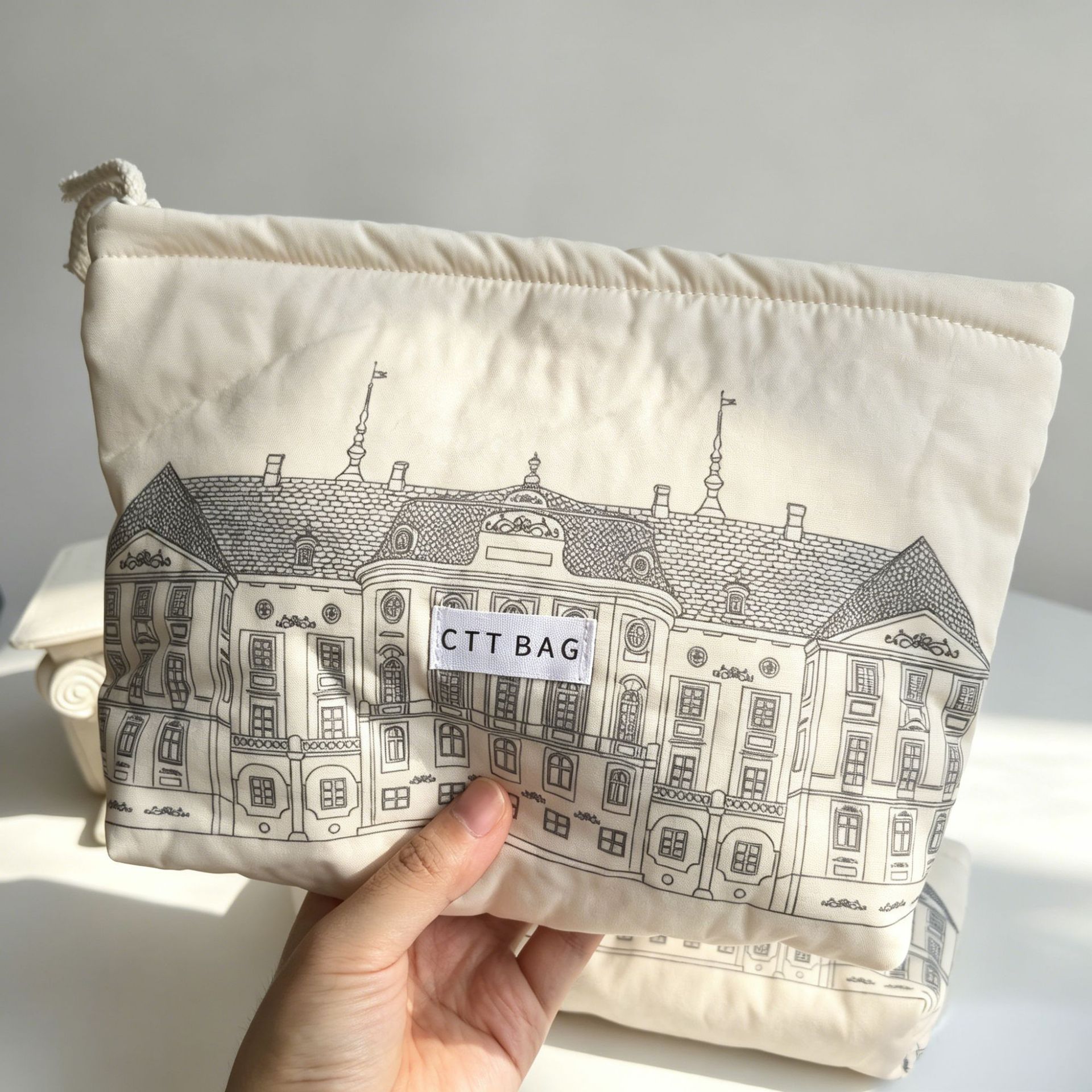 法式简约建筑素描插画风格手拿包大容量化妆包收纳袋笔袋米棉包套