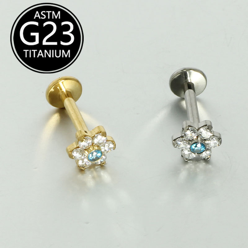 Silver pointed spike labret stud material detail