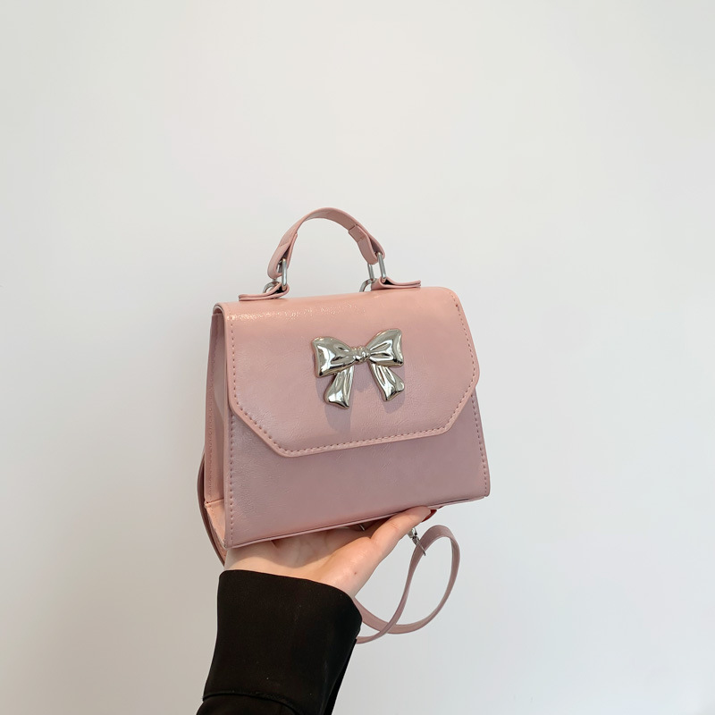 2025 nuevo estilo francés personalidad mochila de hombro de mujer alta sensación de moda simple de hombro de mano pequeña bolsa de mano coreana