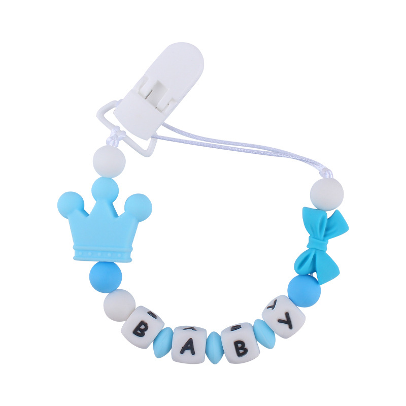 Suministros de bebé corona de dibujos animados cadena anti-gota bebé creativo DIY silicona mordedura pegamento molar chupete cadena