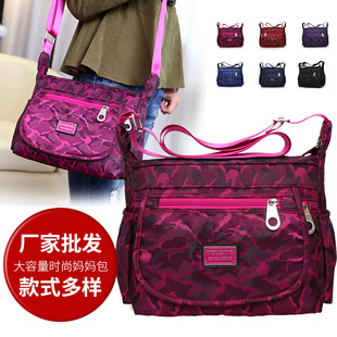 Capacious water repellent shoulder bag, for middle age