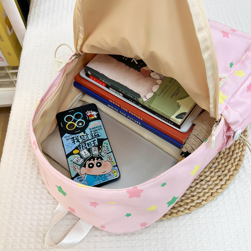 Nueva pequeña fresca mochila de estudiantes de secundaria alta capacidad de impresión ligera mochila de dibujos animados mochila de viaje