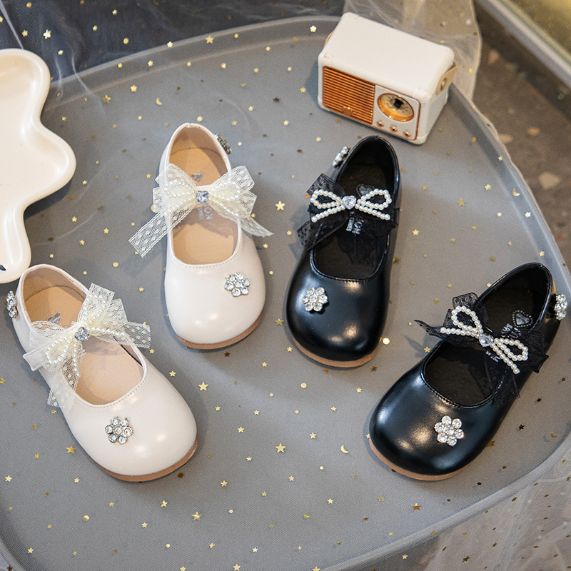 Zapatos de cuero para niñas 2025 otoño nuevo arco para niñas zapatos de princesa de cristal zapatos de moda para niños con suela suave zapatos casuales
