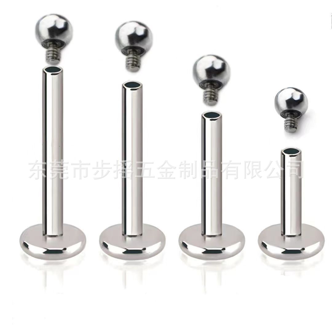 Metal earrings, lip piercing