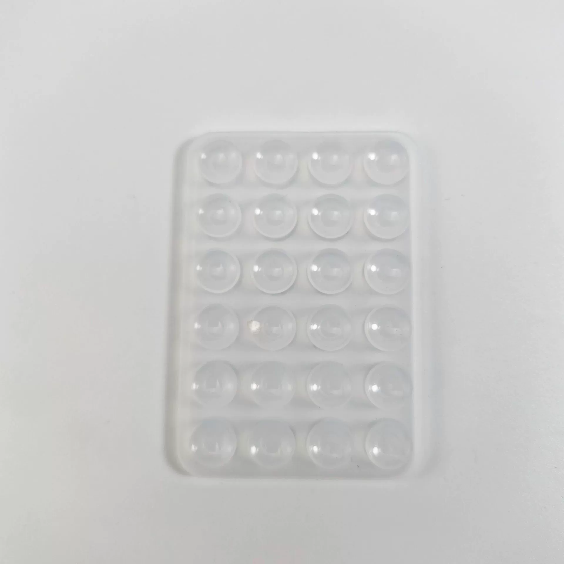 Double-sided silicone suction pads, food-grade, 24- and 40-capsule sizes, ~10 g each