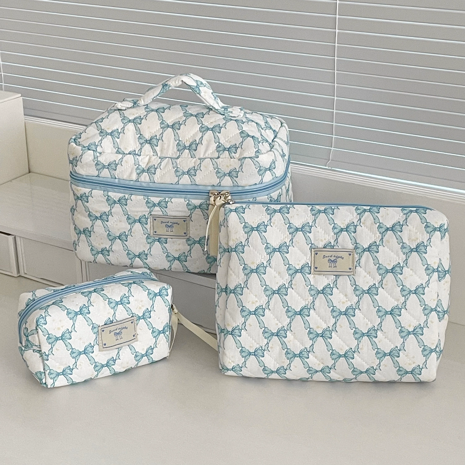 Capacious cosmetic bag with bow, handheld soft organizer bag, flowered