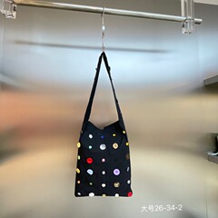 バッグ女性2025新商品ネット赤同型カラーボタン帆布トートバッグファッションシングル肩脇下バッグ潮