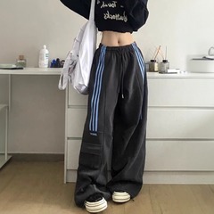 アメリカのレトロなつなぎ合わせの三条の高腰の運動のカジュアルなズボンの女性の秋冬のゆったりしている広足の百合のまっすぐな筒の工装のズボン