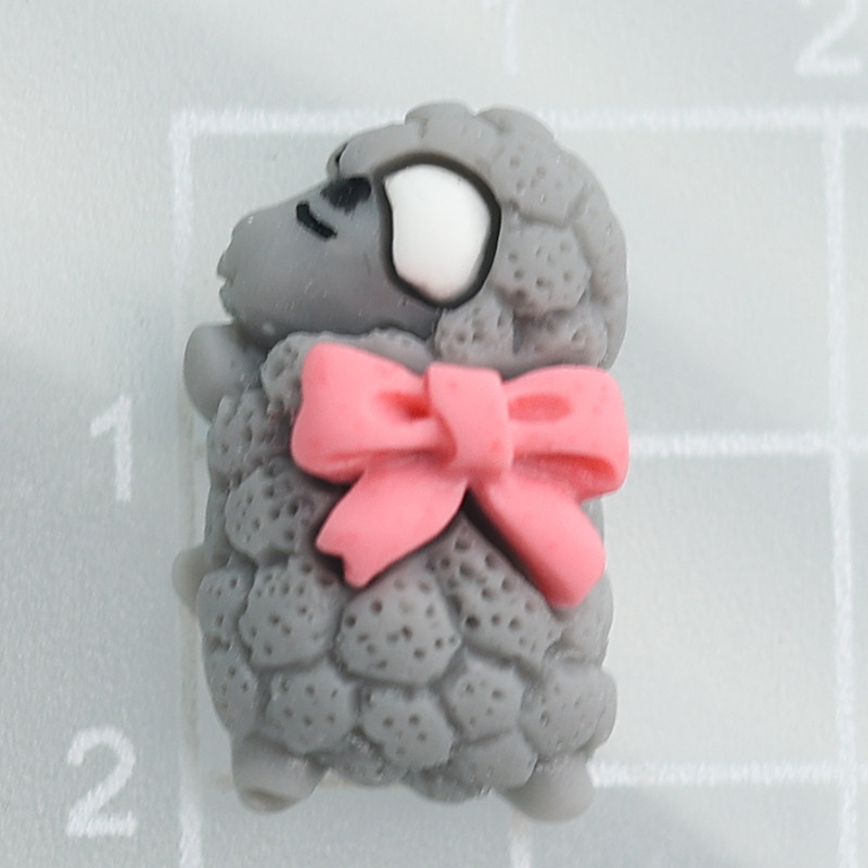 수지 경향이있는 양 1.3x2.1cm