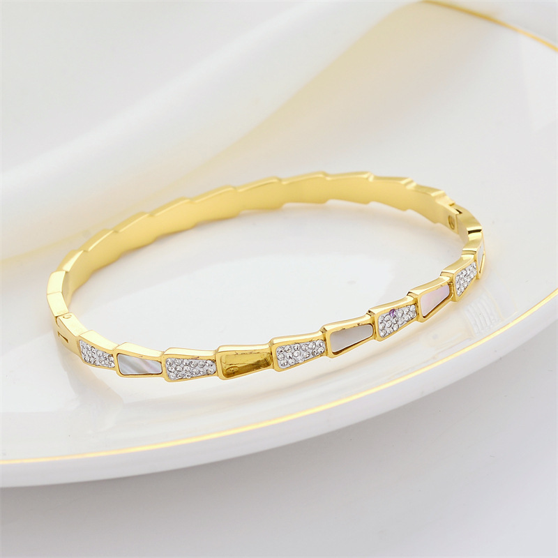 Personalidad de moda transfronteriza aleatoria pulsera de hueso de serpiente temperamento ligero lujoso viento micro-pantalón joyería pulsera de hoja de ventilador de piedra