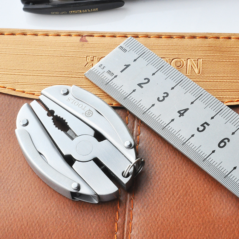 Regalo multifuncional llavero mamut alicates de acero inoxidable cuchillo plegable portátil EDC gafas herramienta de reparación entrega urgente