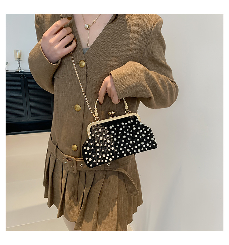 Bolso de las mujeres bolso de la cadena de la perla 2024 principios de primavera nueva moda bolso de hombro fresco dulce hermoso bolso crossbody de aspecto alto para las mujeres