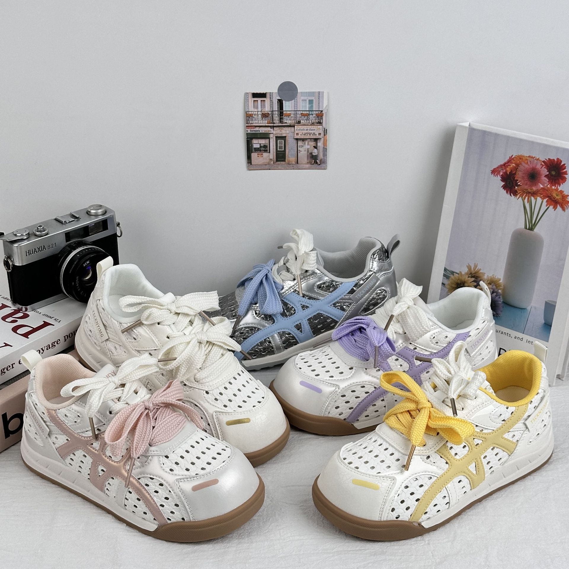 A9920 zapatos de pan para mujer 2025 nuevo estilo verano delgado malla hueca transpirable zapatos de entrenamiento alemán ins zapatos con agujeros de todo fósforo