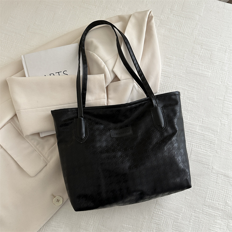 Bolso de mano de viaje al trabajo 2024 primavera nuevo bolso de ocio universal bolso de hombro brazo bolso de mano coreano