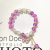 S582 deep purple burst rhinestone butterfly