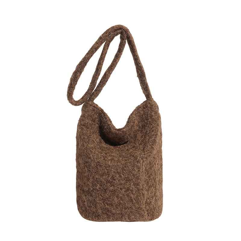 Bolsa de moda coreana de lana 2025 nuevo bolso de cubo de peluche suave glutinoso estilo extranjero de moda bolso de hombro de una sola mujer