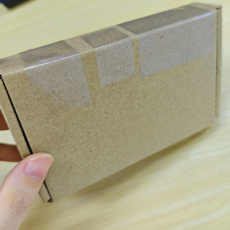 現物透明長方形のシールは粘着テープを貼ります。|undefined