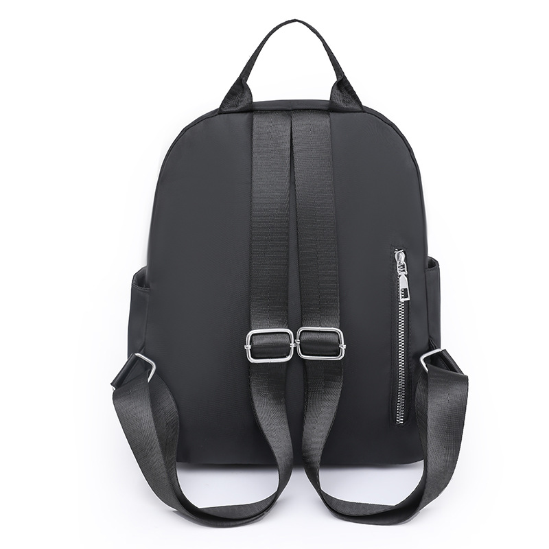 2023 primavera nuevo estilo casual damas mochila de nailon moda simple de gran capacidad bordado mochila de viaje al por mayor