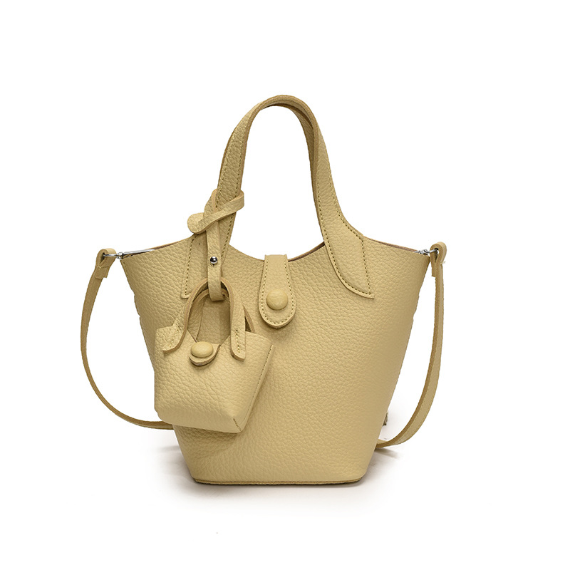 2025 nuevo bolso de canasta de verduras con patrón de lichi para mujer bolso de cubo de gran capacidad de alta calidad diseño de nicho bolso de mensajero de un solo hombro