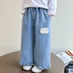 女の子のジーパンの春の服の2025新型の子供の洋気の韓国版の流行の広い足のズボンの小さい女の子の春のタイプのズボンの潮