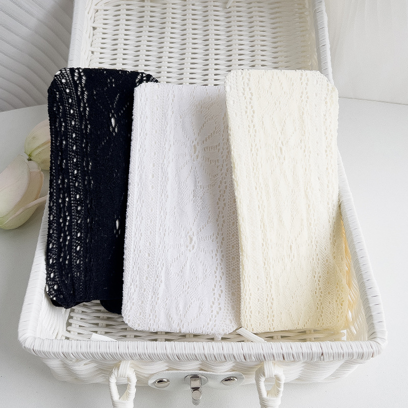 Calcetines de fondo fino de verano de las mujeres hueco red de pesca crisantemo ins moda dulce blanco y negro adelgazamiento todo partido pantimedias fabricantes lote