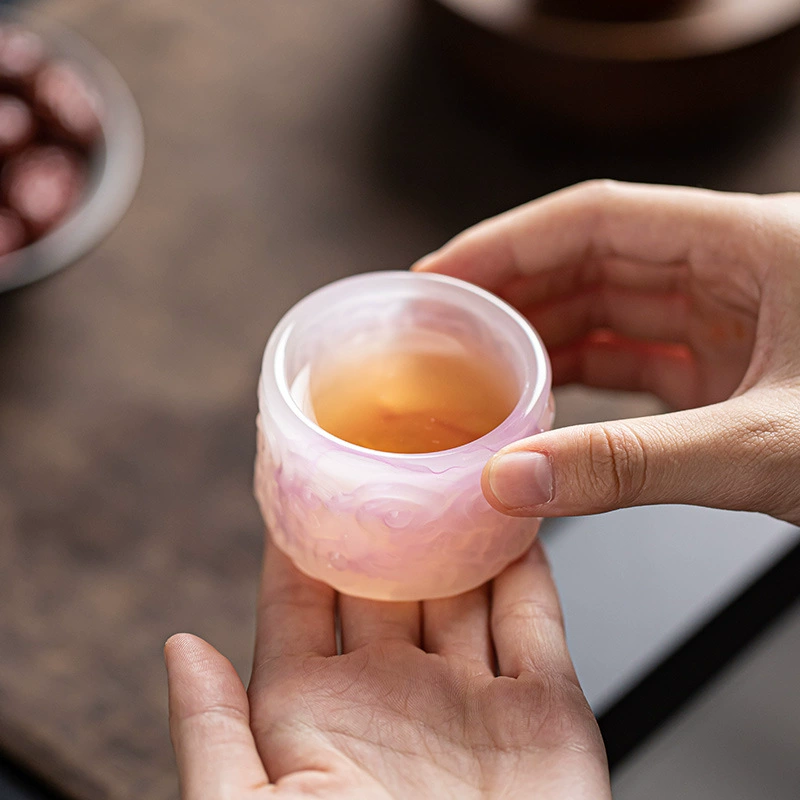 Fuchsia flavored tea, wineglass