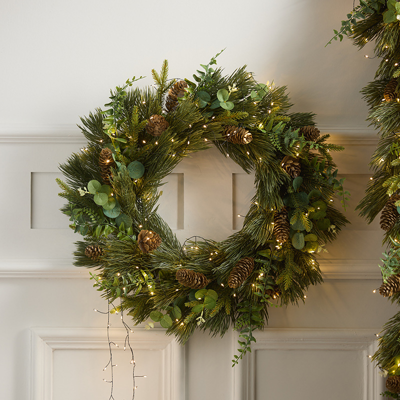 Nuevas decoraciones de Navidad transfronterizas de corona de flores de pe varilla puerta colgante de pared ventanas de diseño de props de disparo