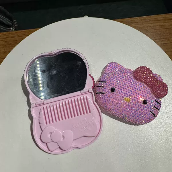 Pocket mirror round cat head+comb+material bag (jelly powder+jelly powder)