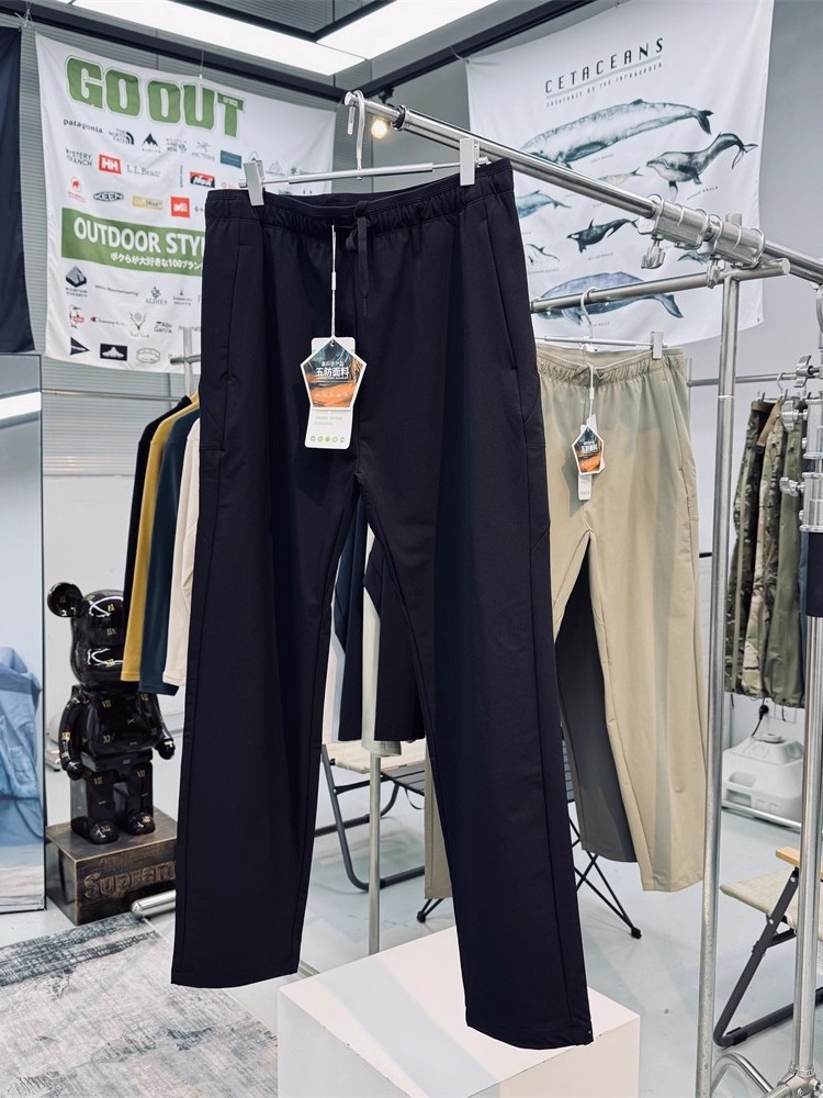 Pantalones al aire libre de cáscara blanda para hombres y mujeres pantalones de otoño impermeables al desgaste pantalones de montaña pantalones deportivos casuales