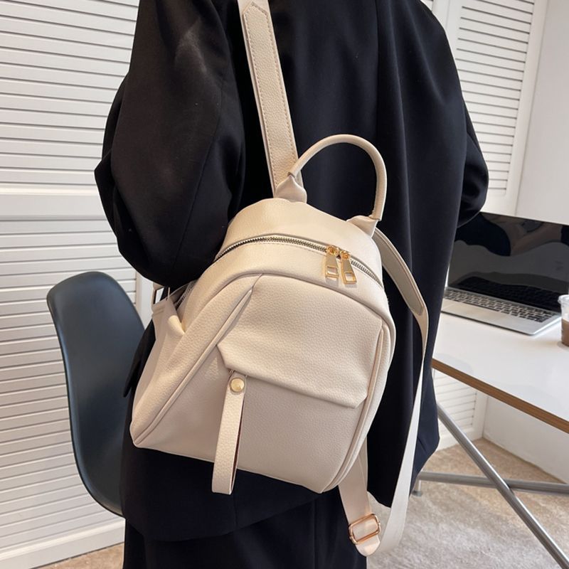 Comercio exterior al por mayor 2024 nuevo estilo casual cuero suave señoras mochila moda todo-fósforo arte viajes mochila pequeña bolso femenino