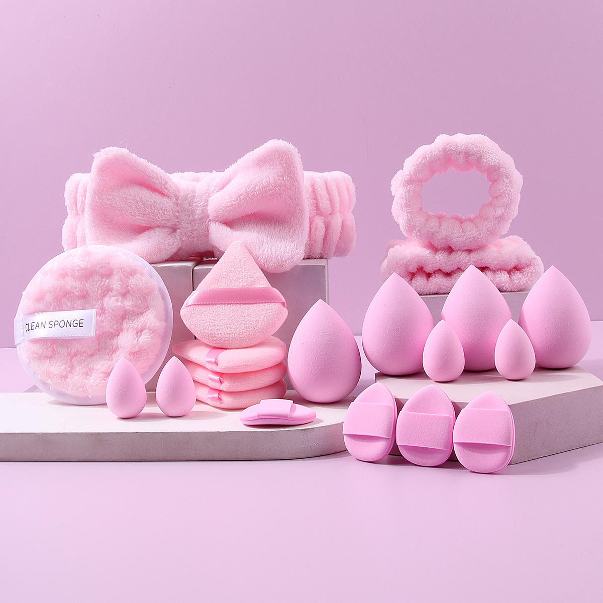 Explosiones transfronterizas desmaquillaje triángulo pulgar polvo conjunto correa de cabello combinación de huevo de maquillaje lavado de la cara esponja absorción correa de muñeca