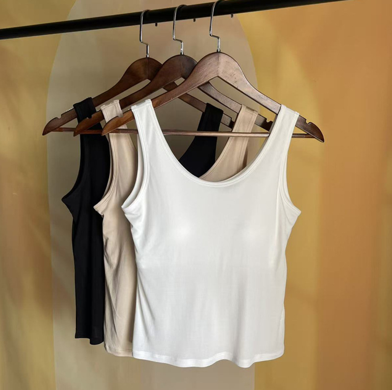 42 o'lchamli ayollar uchun trikotaj ipakdan yasalgan, ichki tasmali qo'shimcha uzun yelek, 100% tut ipakdan, yupqa ichki kiyim.