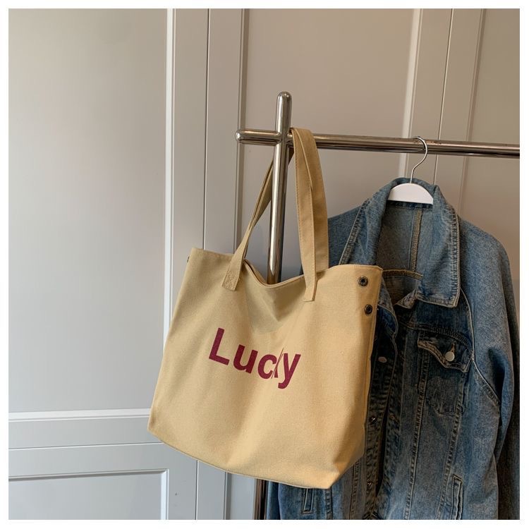 2023 nuevo estilo coreano clásico letras simple bolso de hombro estilo académico bolso casual de gran capacidad