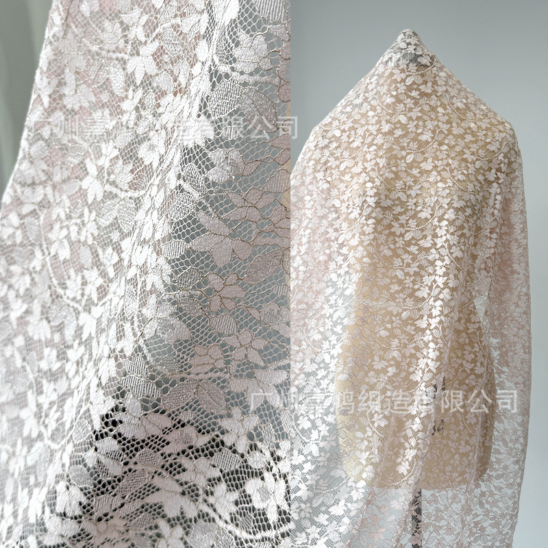 Tejido de encaje de nylon brillante oro francés temperamento de mujer falda flor de encaje fábrica de stock