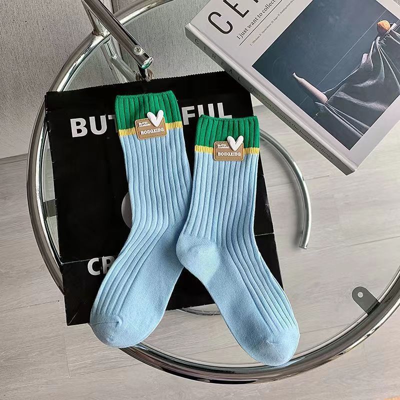 Calcetines de algodón de color puro calcetines de mujer de otoño e invierno a media pantorrilla calcetines de dopamina desgaste ins moda doble aguja amor Rosa pila Calcetines