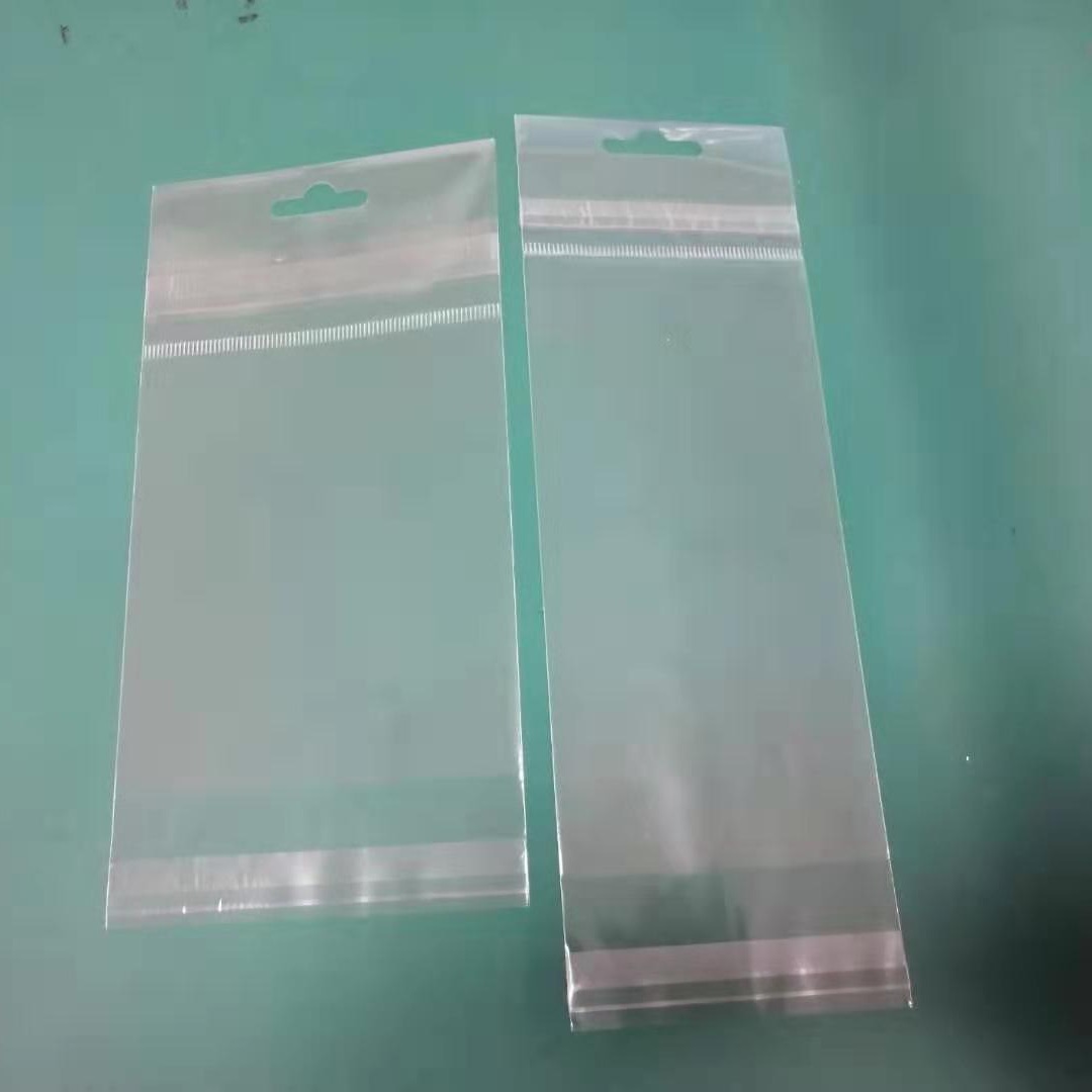 厂家供应OPP双自粘卡头袋 OPP入卡纸袋 OPP塑料袋子不干胶