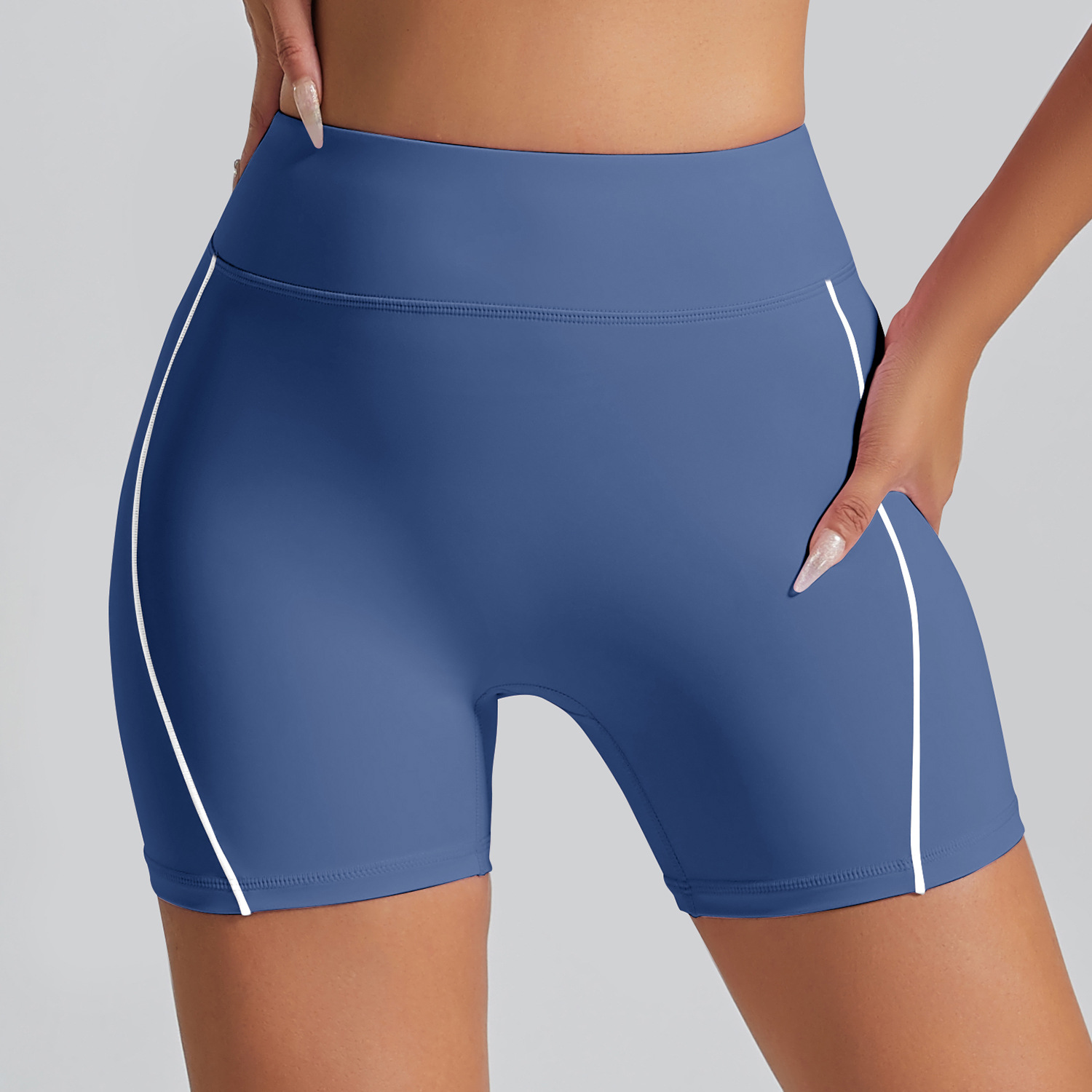 Pantalones cortos deportivos de color de contraste europeo y americano sin línea de vergüenza Cintura alta, ajustados desnudos, pantalones de yoga de fitness de cadera de melocotón, pantalones de tres puntos
