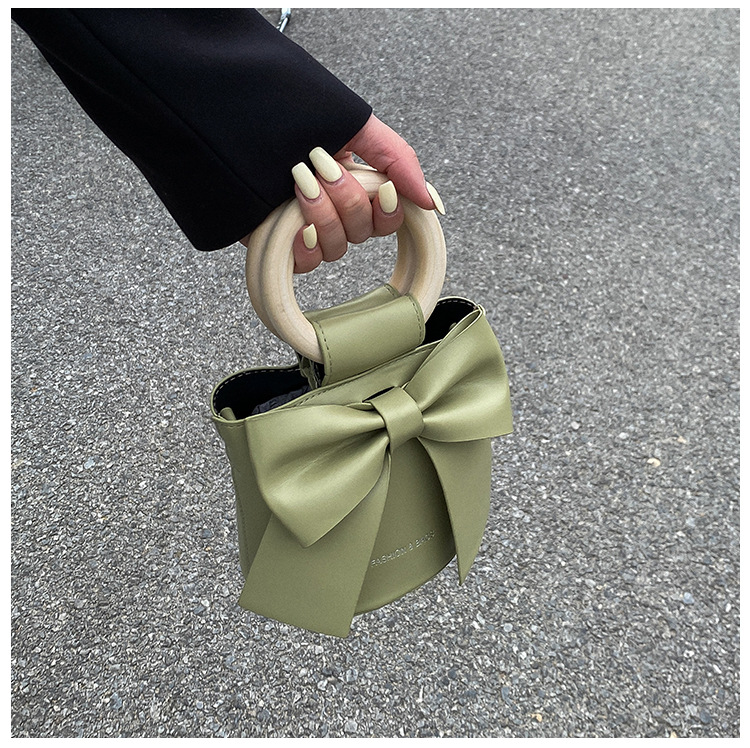 455g Weight Synthetic Leather Lining Material Sewing Thread Fashion Element Magnetic Buckle Closure Type Single Shoulder Strap, Double Handle Strap Type Bucket Bag Bags Type Casual Occasion Pu Leather Material Bow Knot Pattern All Seasons Season Women's Gender Elegant Style Bucket Shape Small Size Women's Small Pu Leather Bow Knot Elegant Sewing Thread Bucket Magnetic Buckle Bucket Bag 12